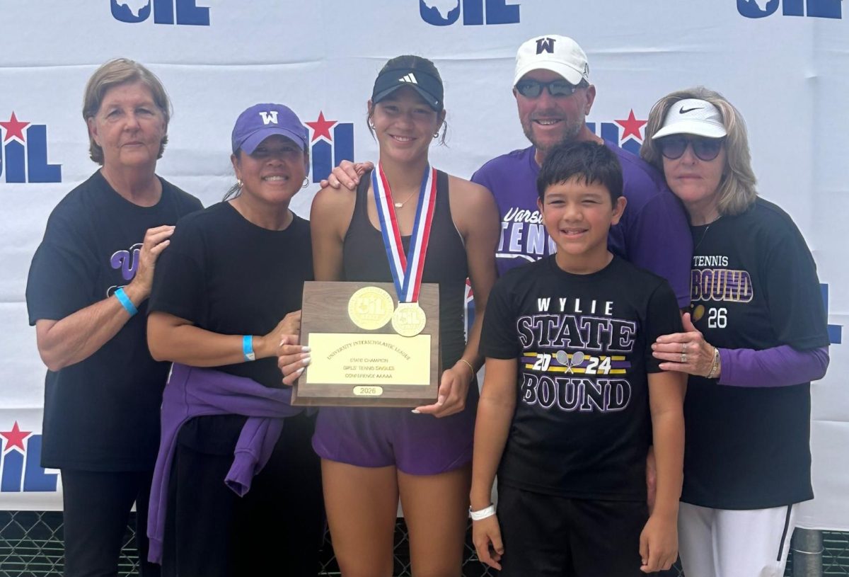 Hope Willis with her family after her state win. 