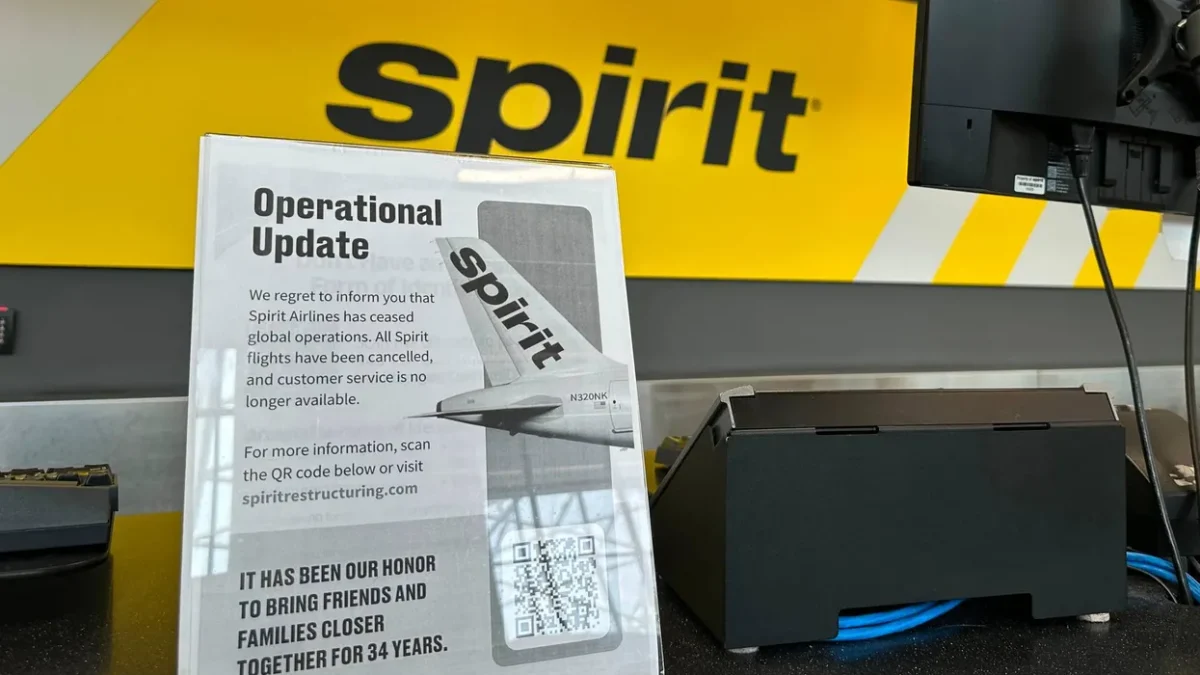 Sign detailing the shutdown procedures of Spirit Airlines at their reception.