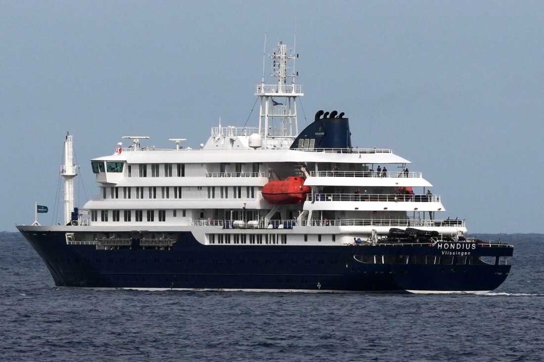 The MV Hondius cruise ship departs the port in Praia, Cape Verde, Wednesday, May 6, 2026. (AP Photo/Misper Apawu)
